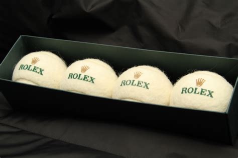 balle de tennis rolex blanche